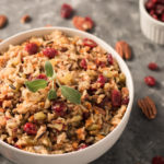 This Holiday Wild Rice Pilaf is a perfect side dish for your holiday feast. The wild rice blend, studded with chopped pecans and dried cranberries, is an oil free, easy, one pot dish. It will be a hit at your next dinner party!