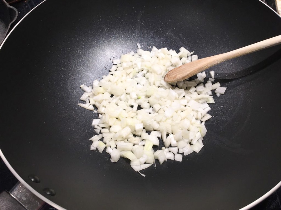 Onions in wok for fried rice