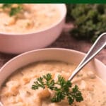 Photo of bowls of potato soup with Pinteret title above the image
