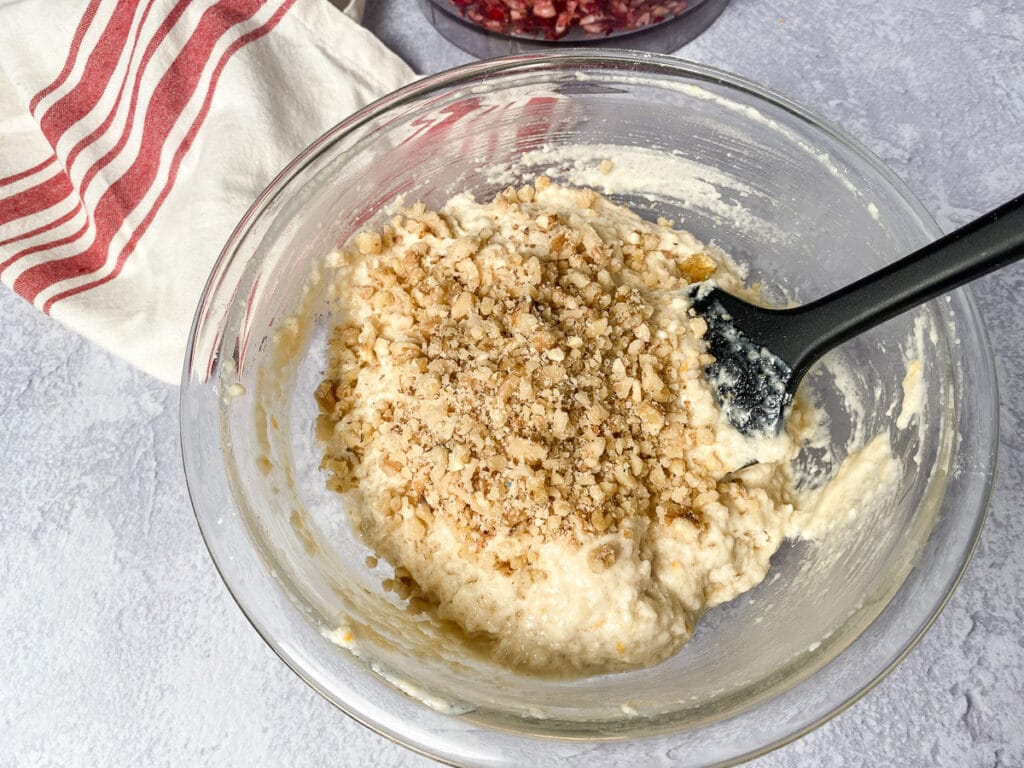 Walnuts added to bowl of batter