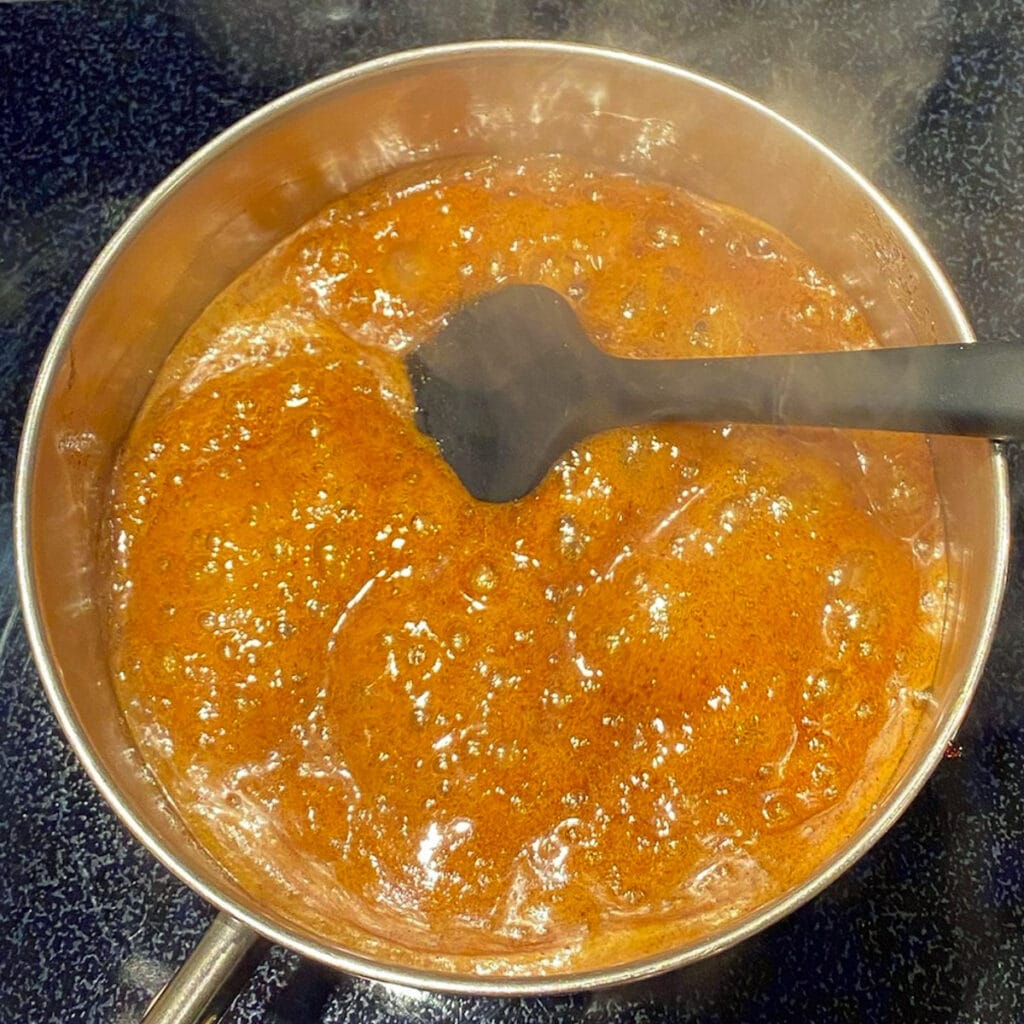 Gingerbread syrup boiling in pot
