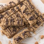 Granola bars on parchment covered cutting board