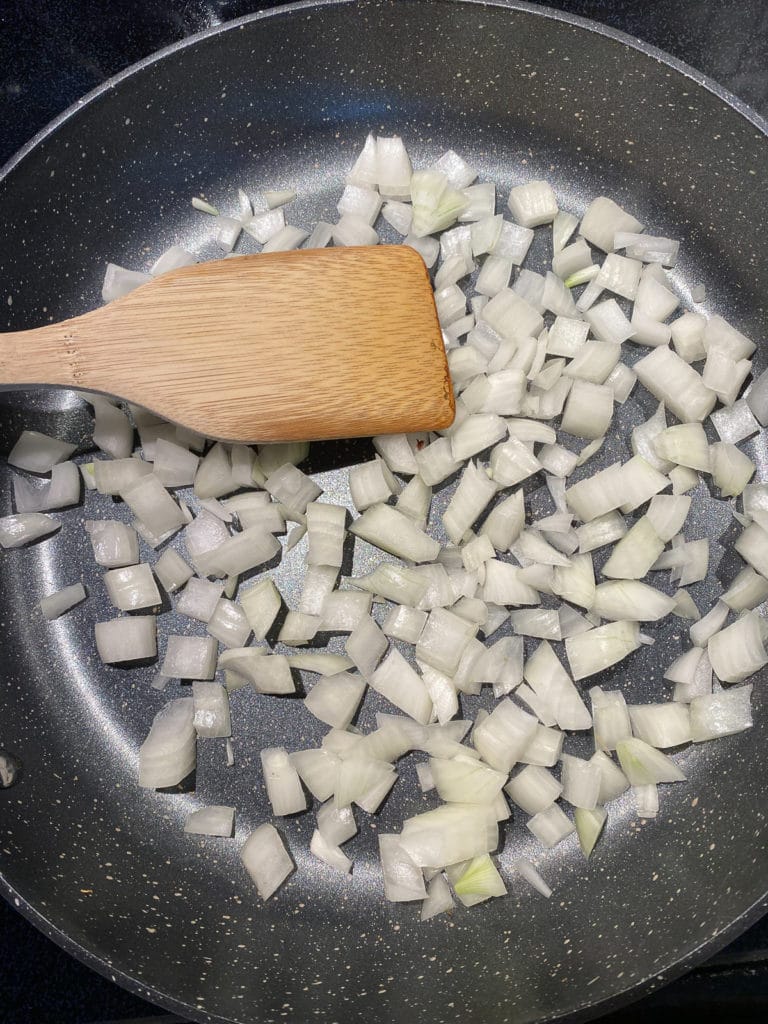 Diced onions in a nonstick skillet
