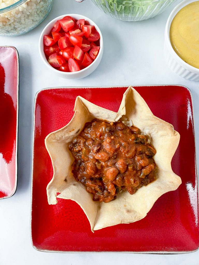 Chili added to tortilla bowl