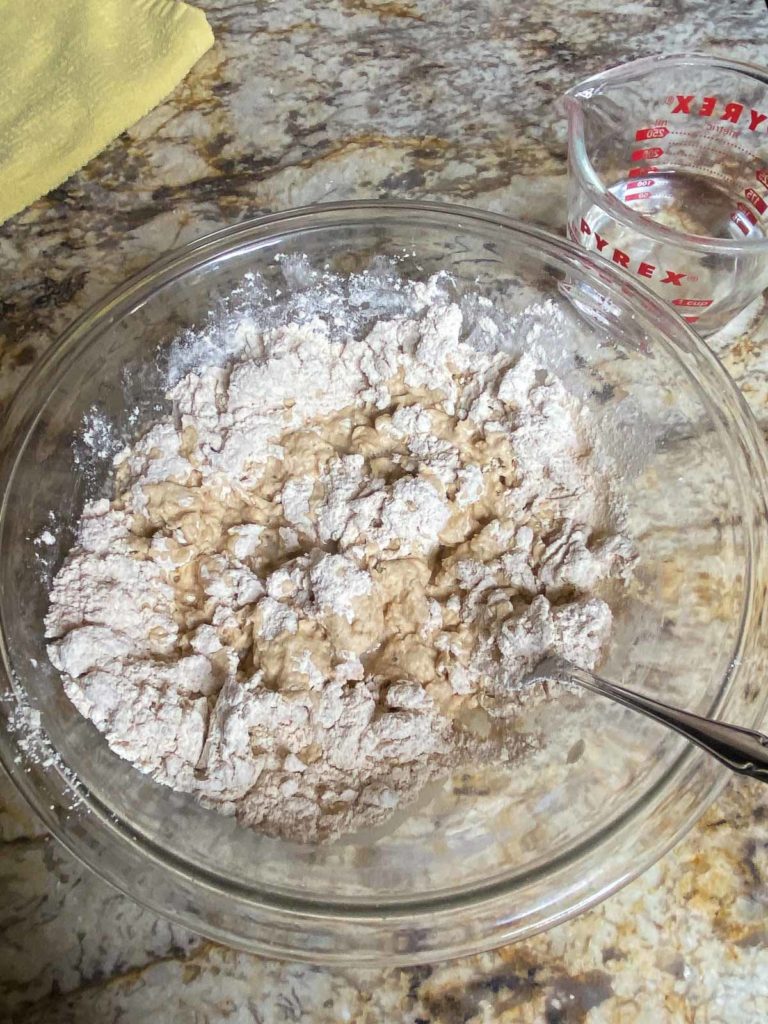 Water being mied into dry ingredients for whole wheat tortillas