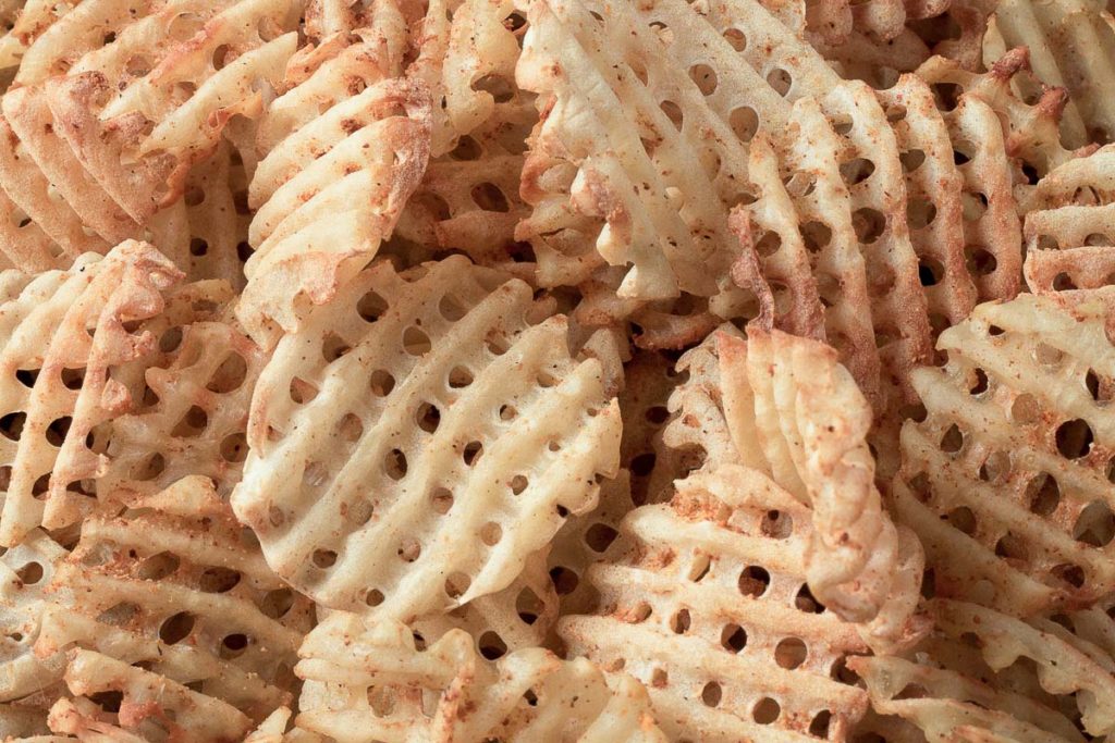Closeup image of waffle fries.