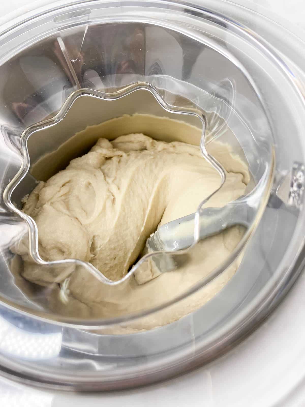 Churned ice cream in ice cream maker.