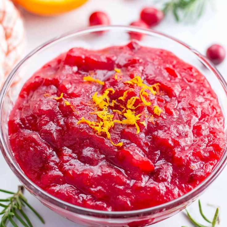 Cranberry sauce in a glass bowl.