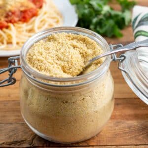 Vegan Parmesan cheese in a glass jar.