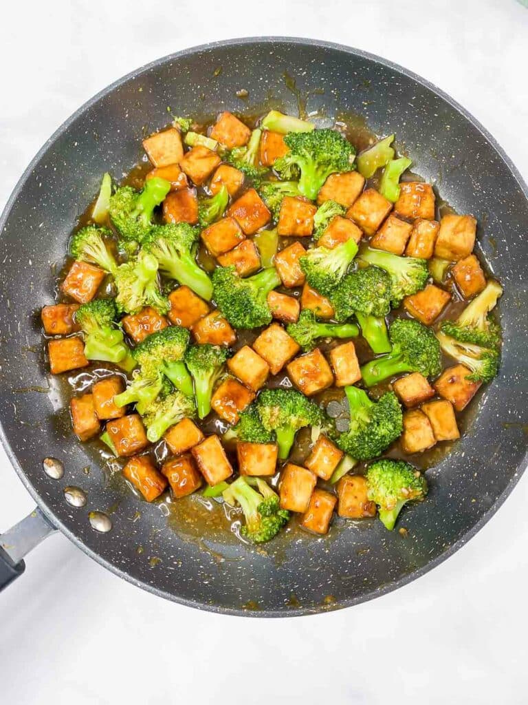 Teriyaki tofu and broccoli in a nonstick skillet.