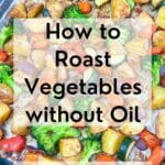 Oil free roasted vegetables on parchment paper in a baking pan with Pinterest Title