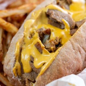 Closeup shot of vegan Philly cheesesteak sandwich.