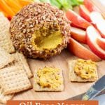 Image of vegan cheese ball with Pinterest text overlay.